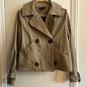 Super cute and trendy medium trench jacket.